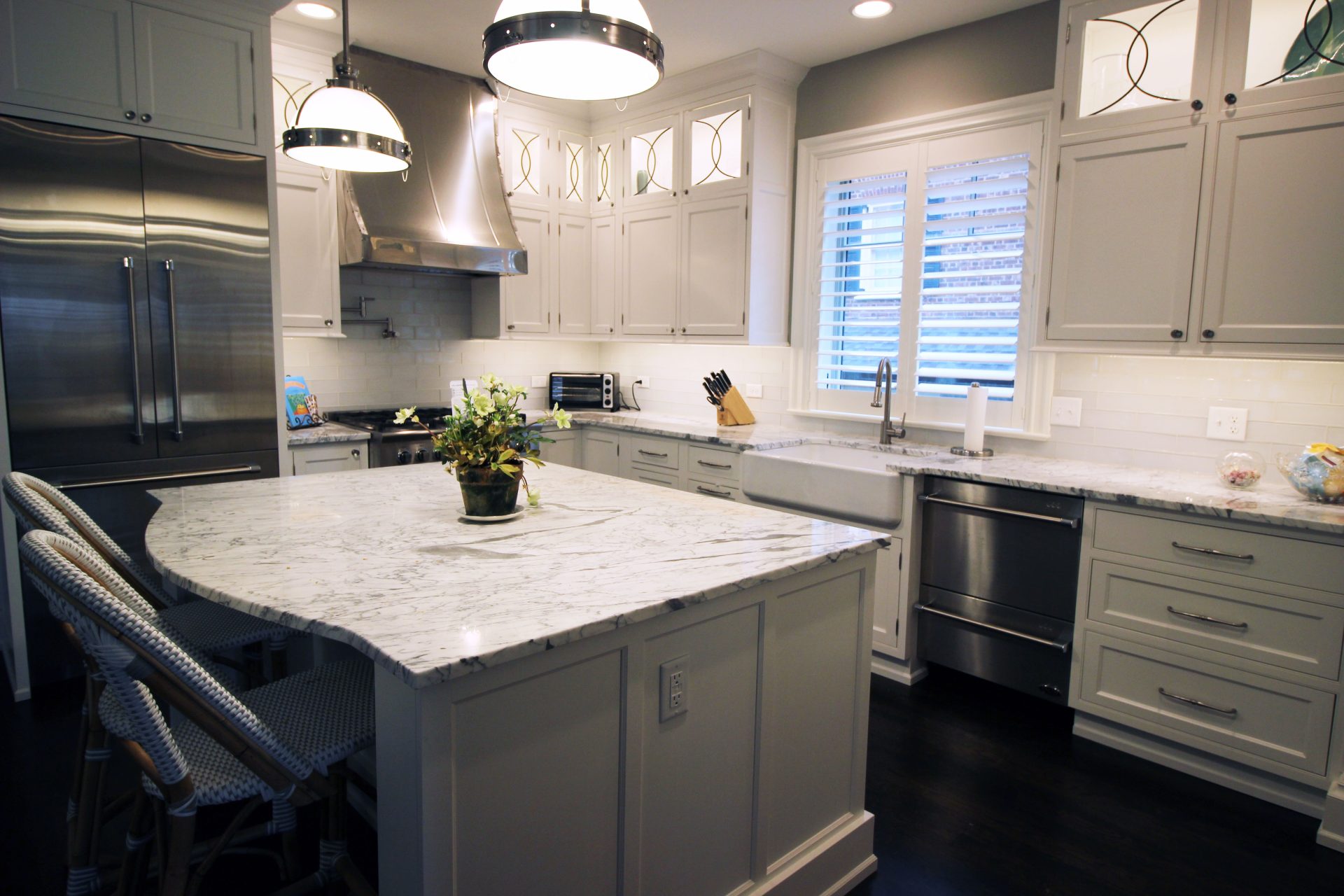 Renovated kitchen with marble countertops